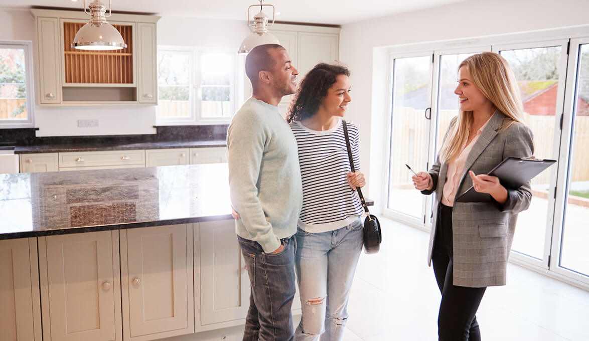 realtor showing home to first time homebuyers