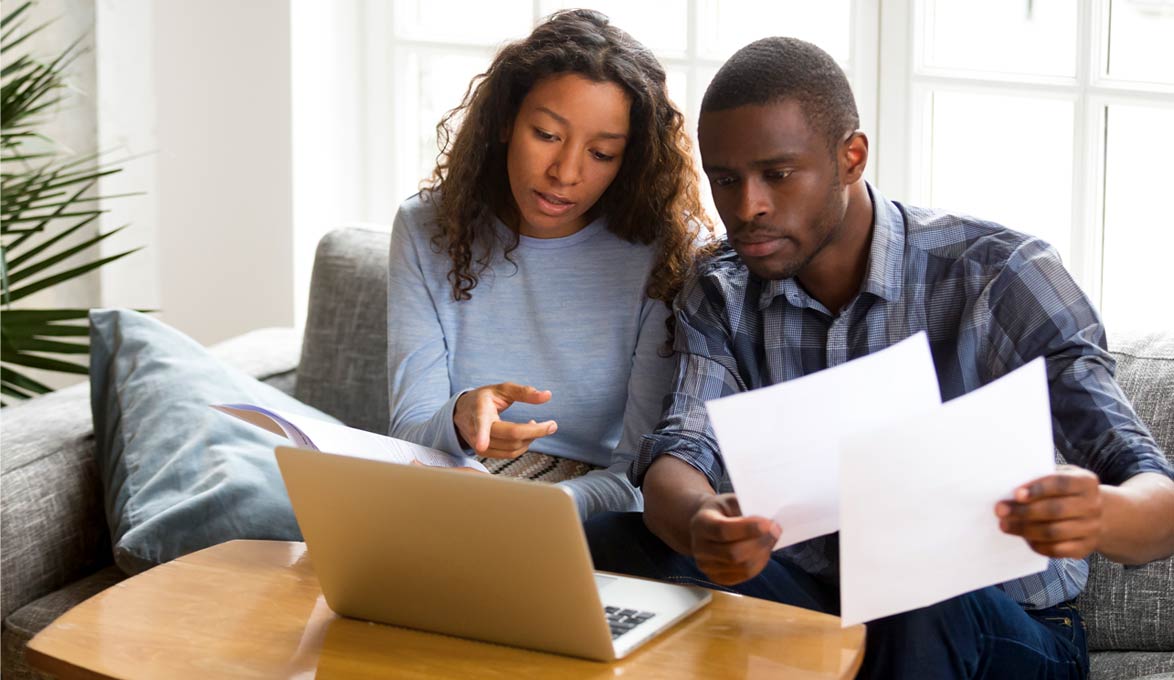 couple discussing monthly financials