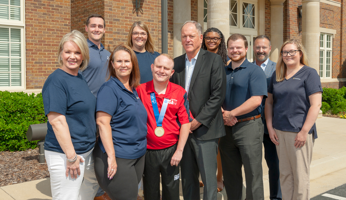Special Olympics Athlete Cody Wheatley with SouthState Bank Team Members at Huntsville Branch