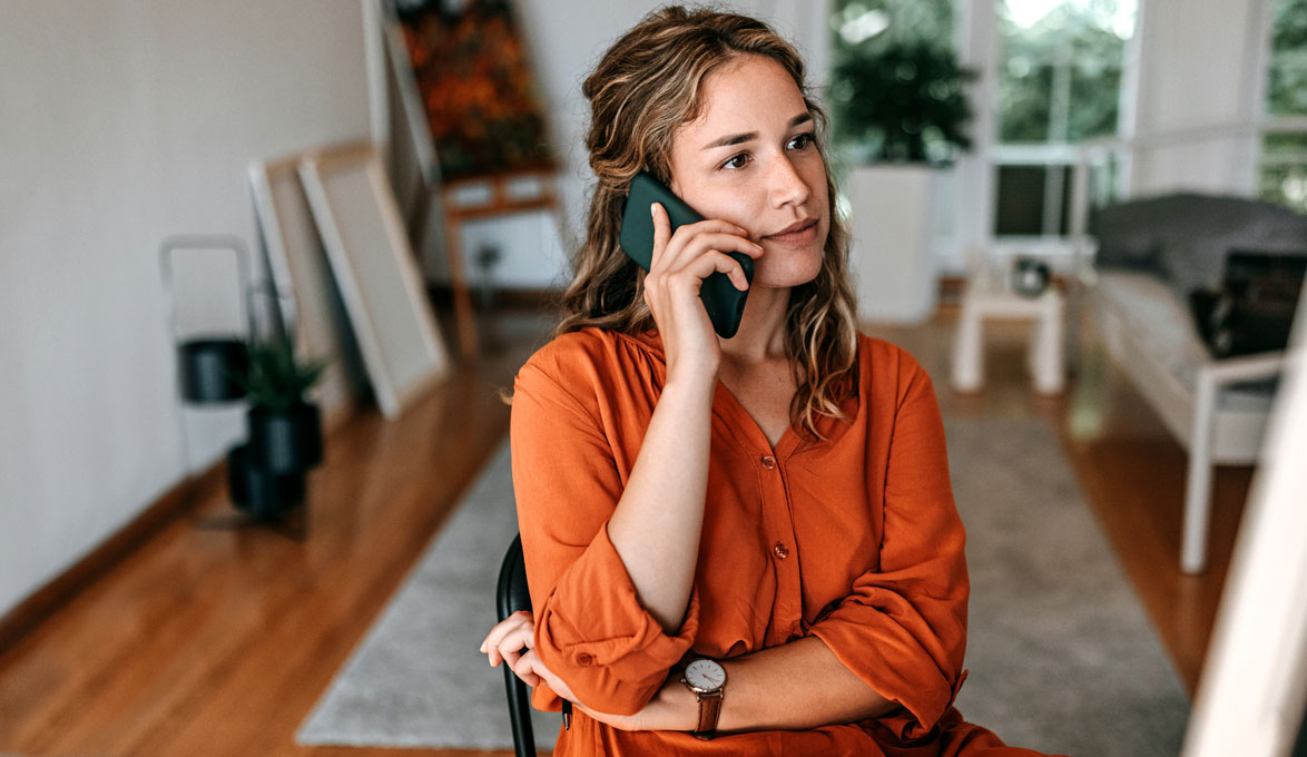 Woman making a call on her cell phone