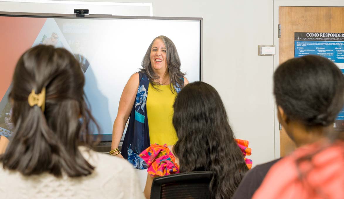 Fernandez Aviles Teaching Financial Literacy Class