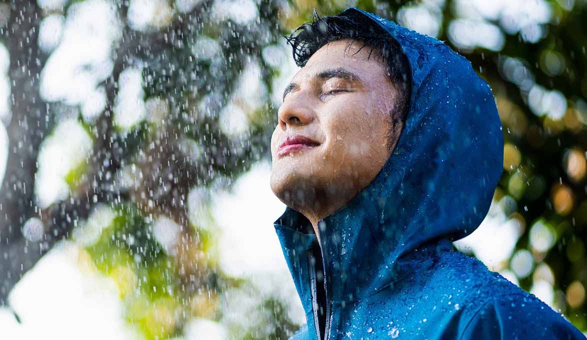 A man standing in the rain