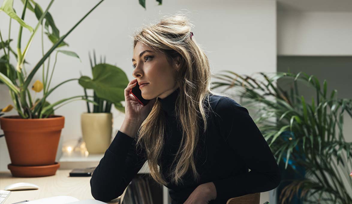 Woman making a call on her cell phone