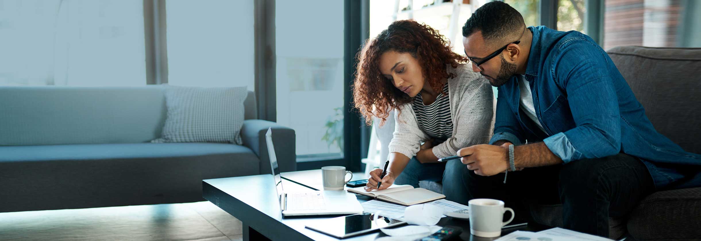Future home owners reviewing loan options