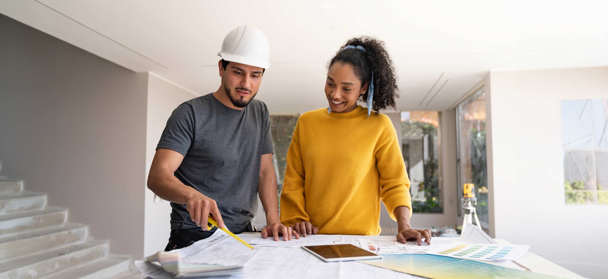 A family planning renovations on their home with a contractor