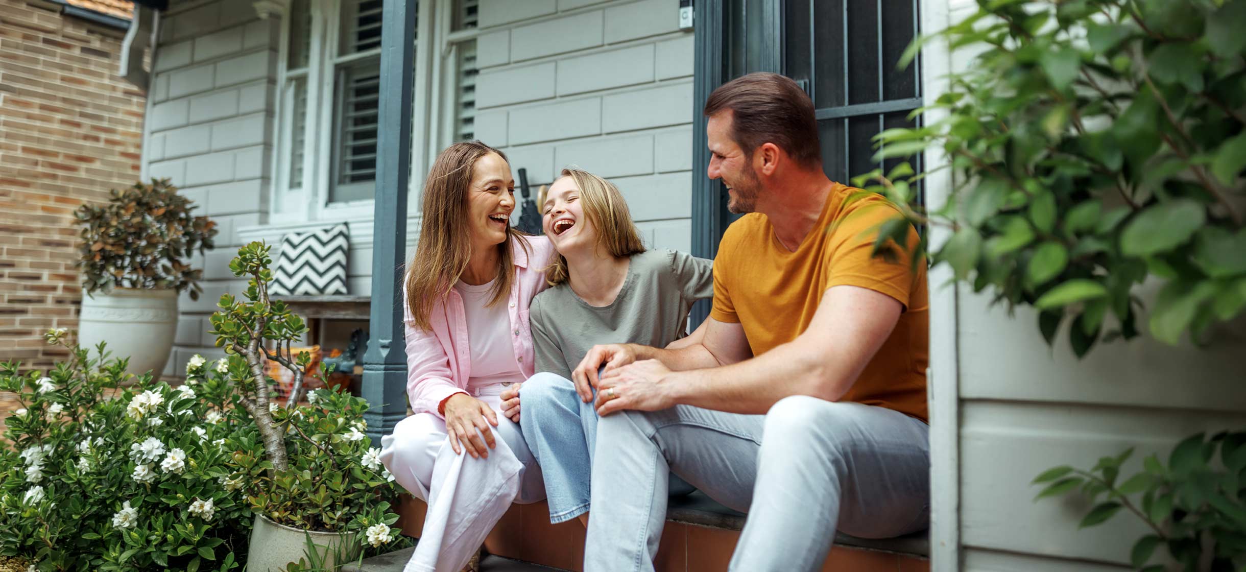 A woman with her dog considering refinancing
