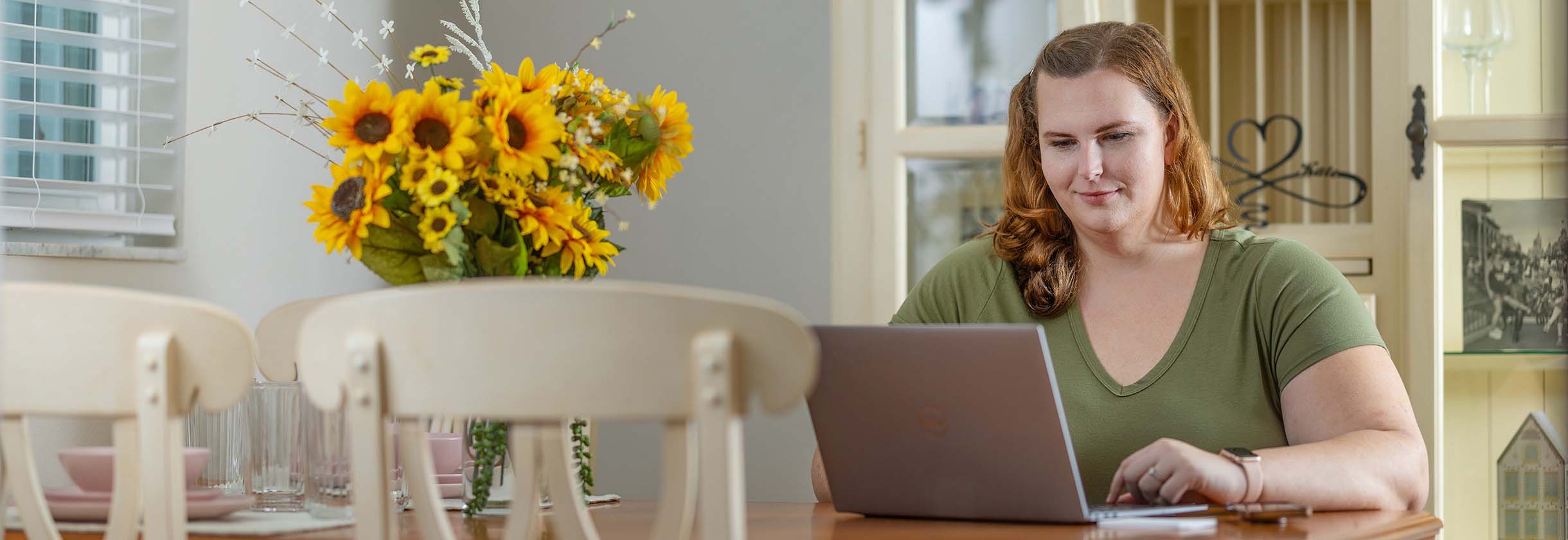 A woman reading an article from SouthState bank on her phone