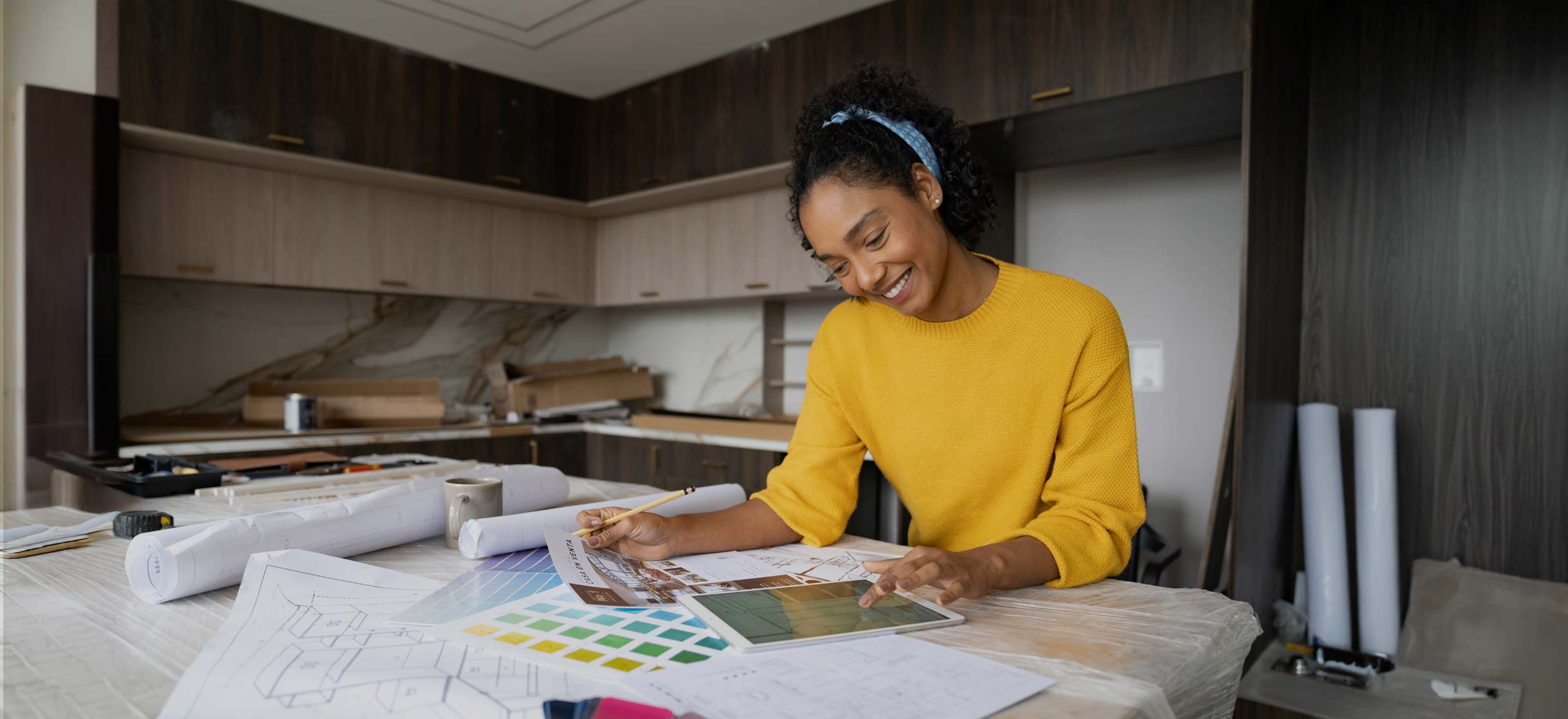 A woman making plans to renovate her home
