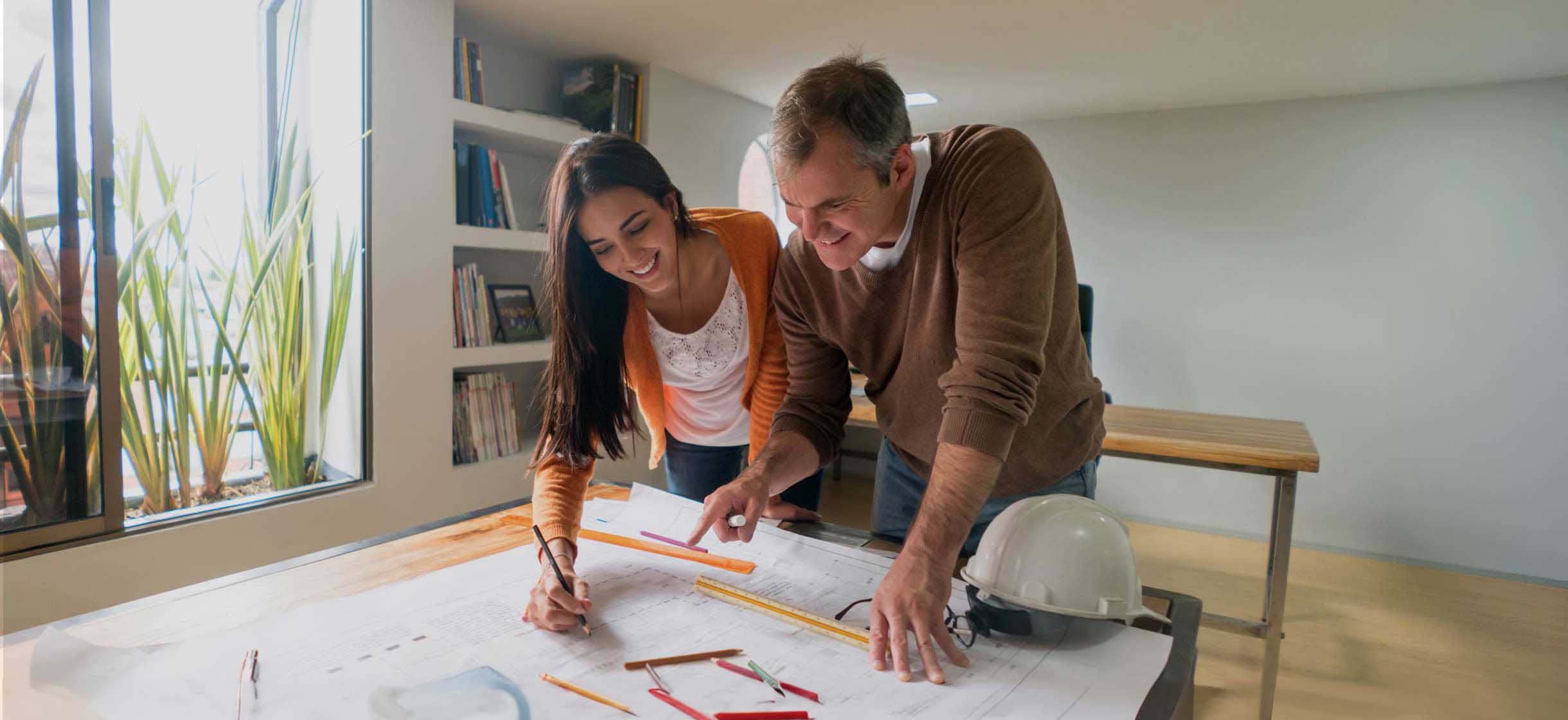 A couple making plans to renovate their home