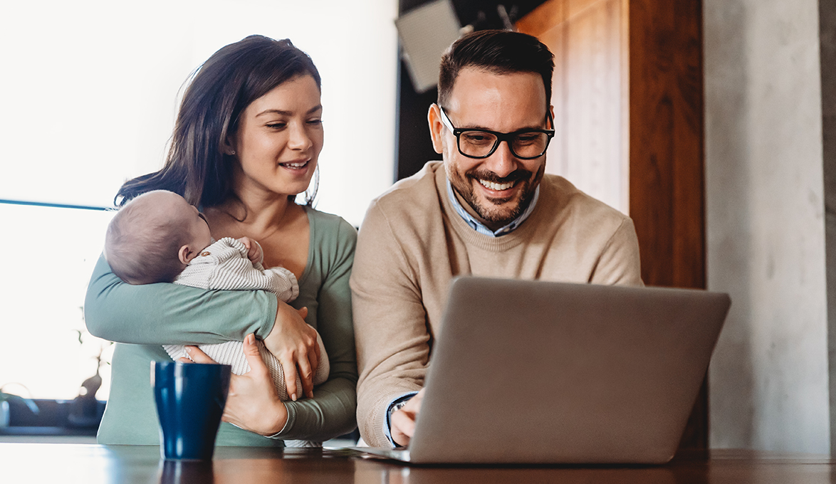 couple calculating the cost of a mortgage.
