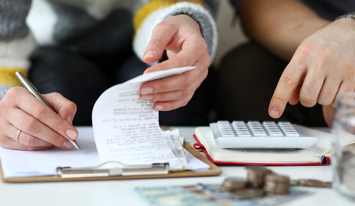 couple learning the basics of budgeting and financial literacy