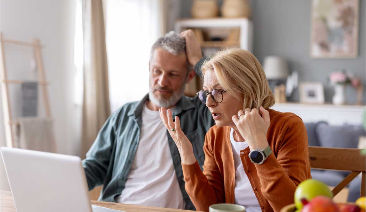 Married Older Couple Seeing Fraudulent Activity Online