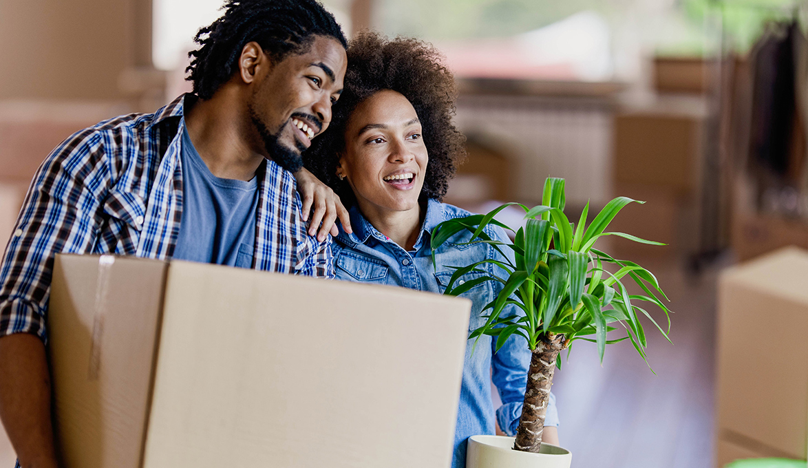 New home owners moving into house.
