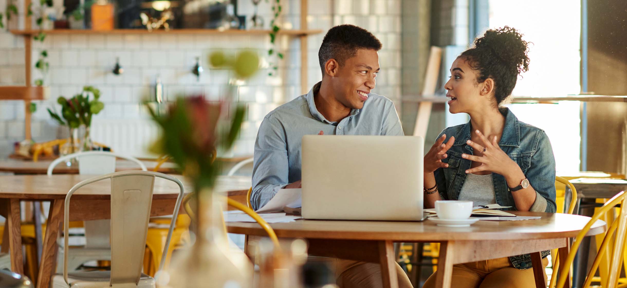 Business partners talking in a coffee shop