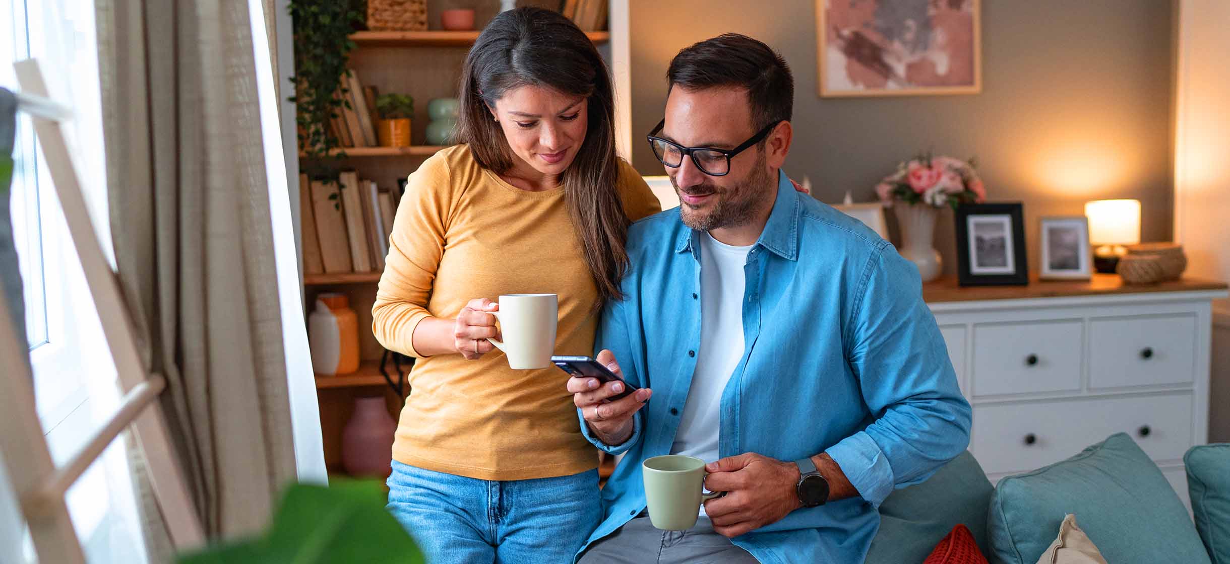 a man reviews his checking account options on mobile with SouthState bank
