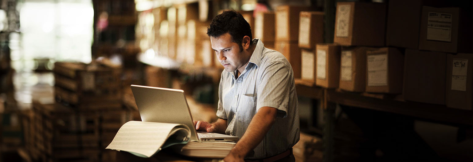 small business owner managing funds online