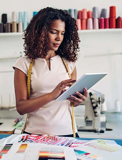 business owner managing finances on phone