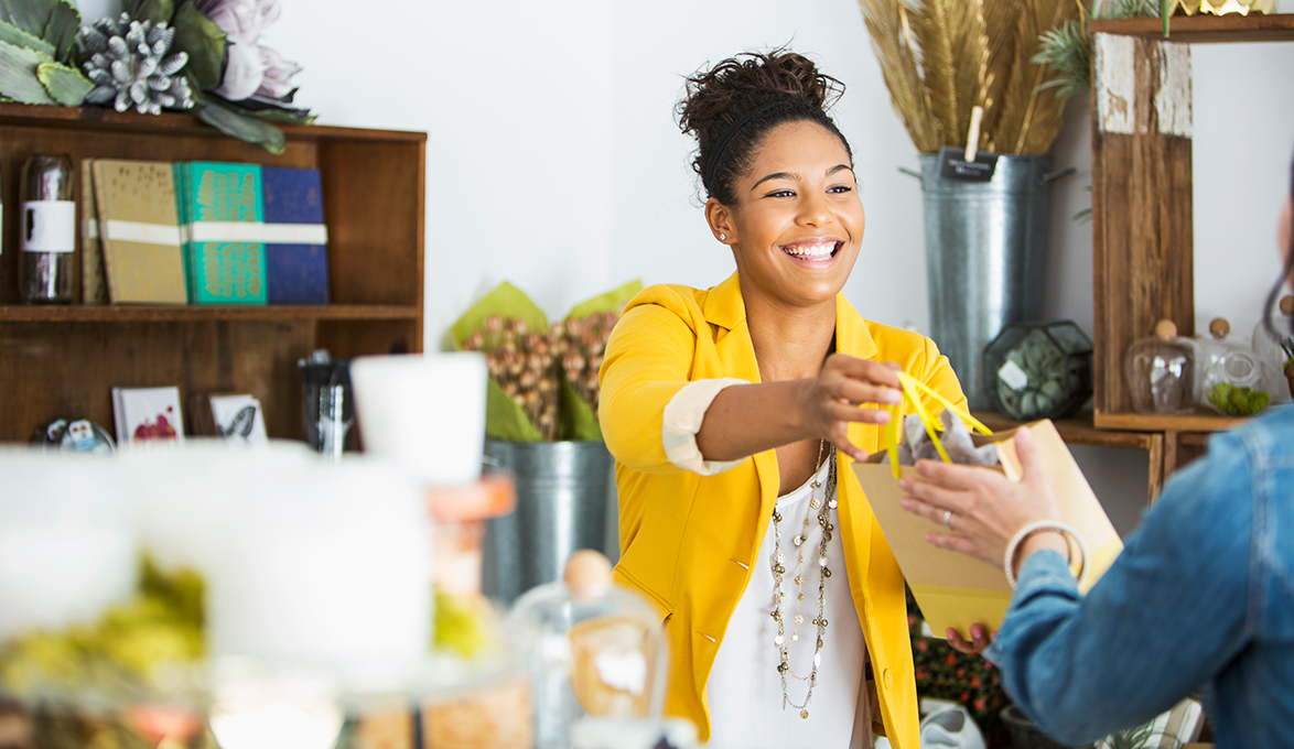 small business owner making effective sale accepting payment