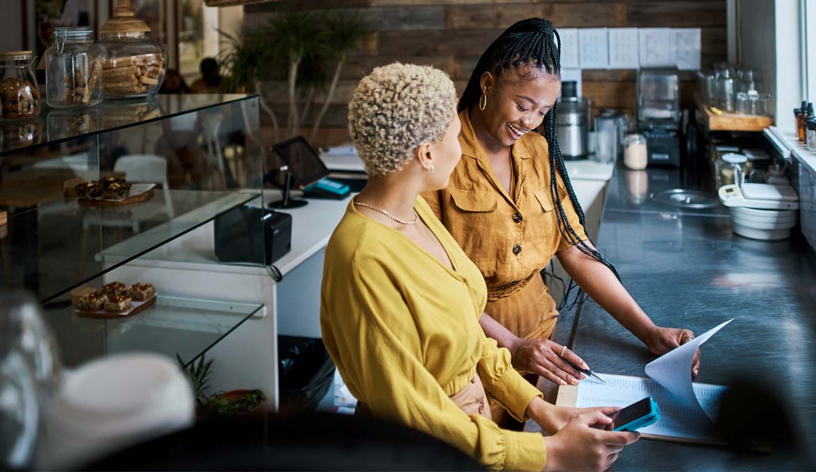 Two women working.