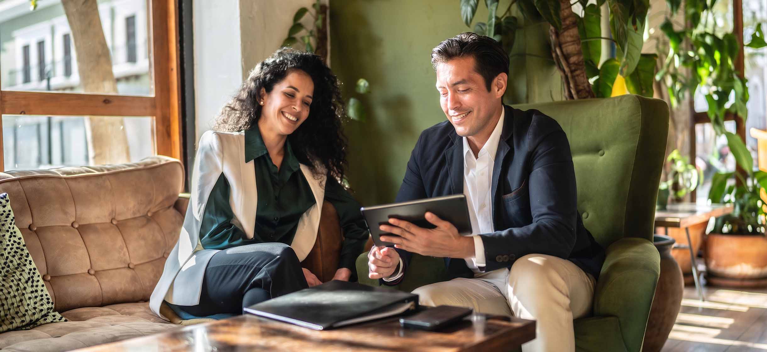 Small business owners working on a tablet