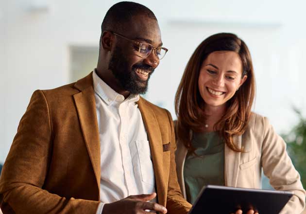 Compliance workers reviewing info