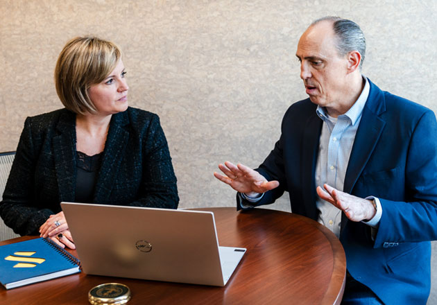 David Adams working with a non-profit business leader