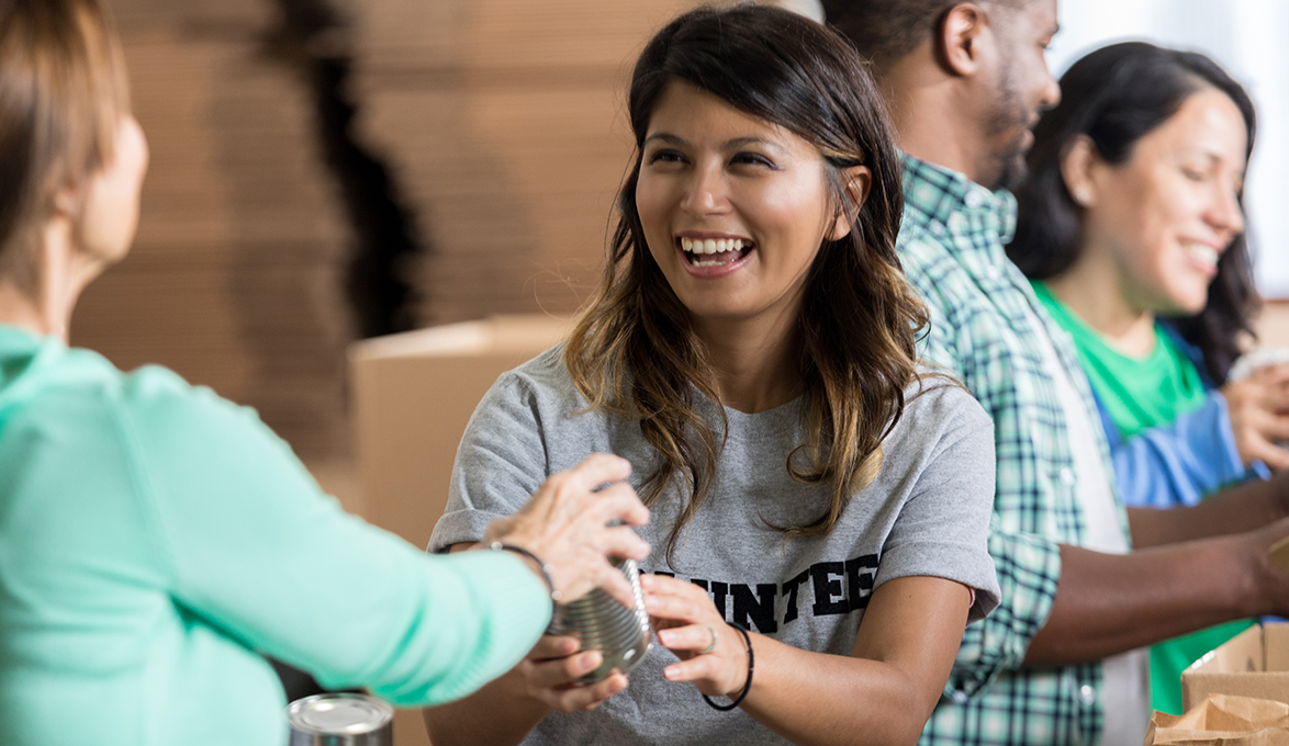 People volunteering at a food bank.