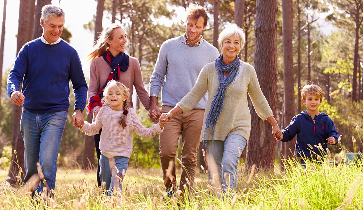 couple enjoying retirement with family and grandchildren