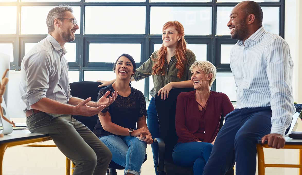 small business owner discussing retirement plan options with employees