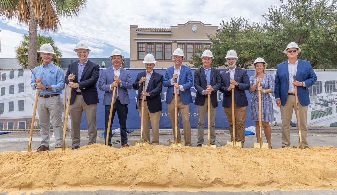 SouthState Executives use golden shovels to ceremonially break ground on a new operations center in downtown Winter Haven Florida