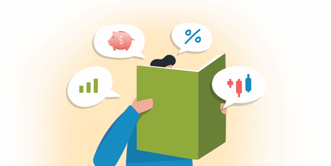 man reading finance book