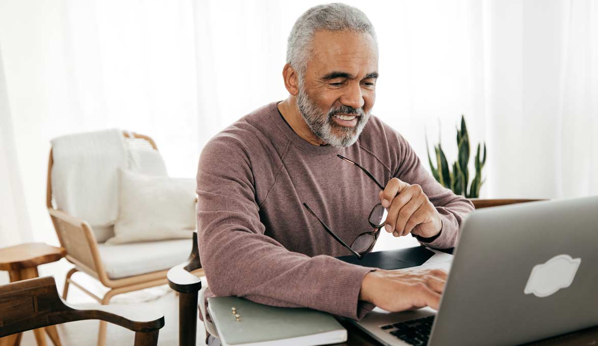 Man using a laptop.