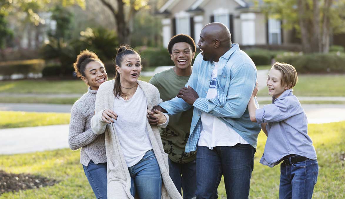Family playing outside.