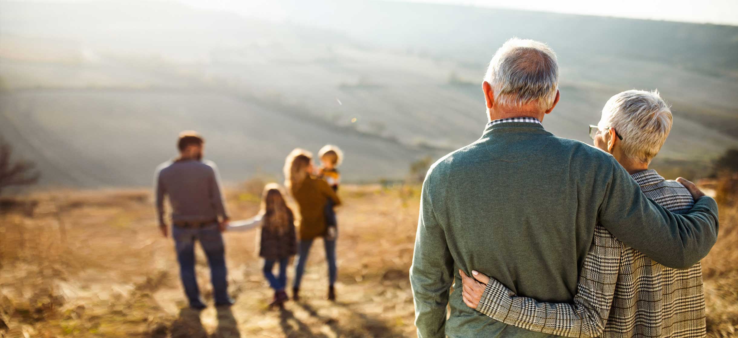 senior couple enjoying travel wiht family during retirement