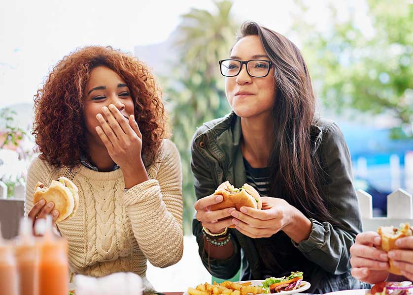 Friends eating lunch at a restaurant